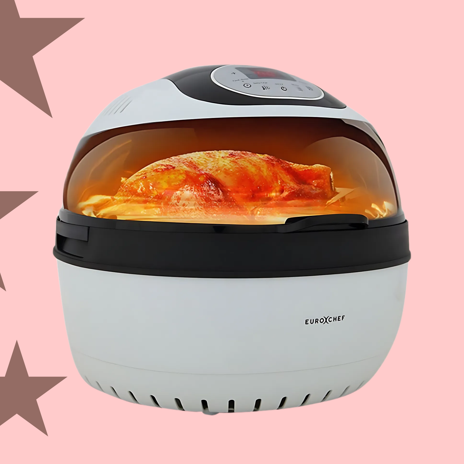 White air fryer with glass window showing chicken on peach coloured background with brown star graphics