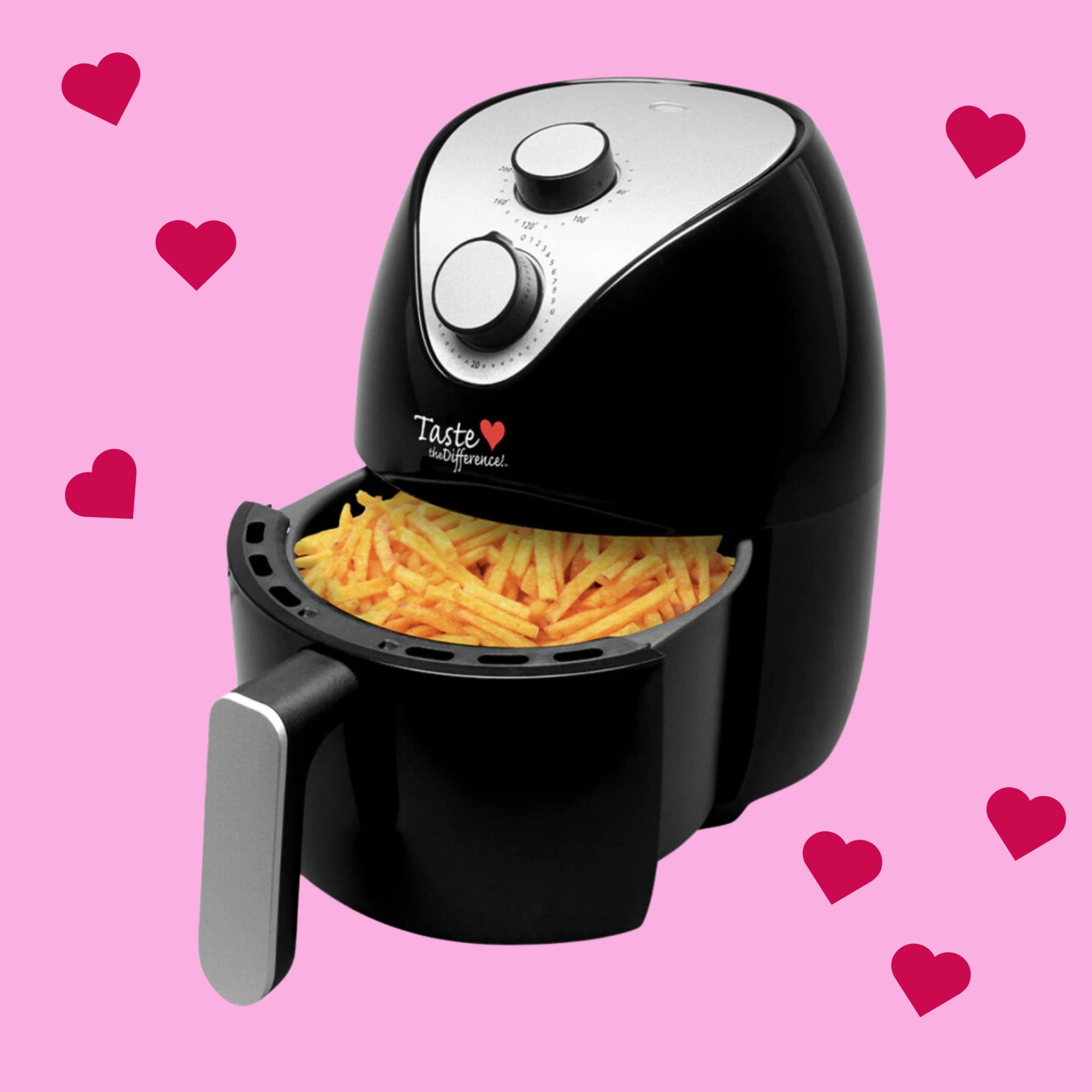 Mini Mate small black air fryer on pink background with love heart graphics 